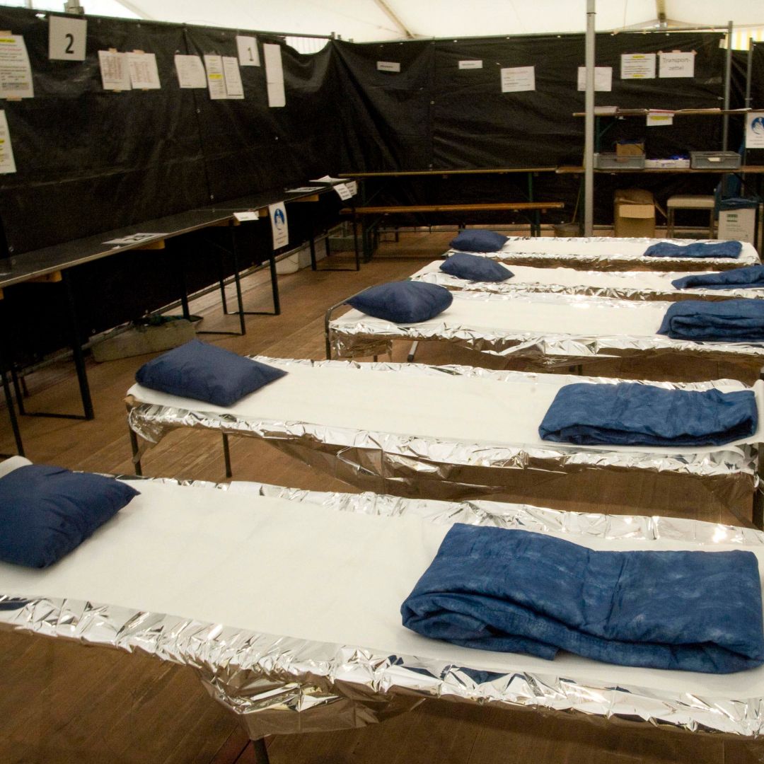 Image of an emergency shelter set up in a recreation facility