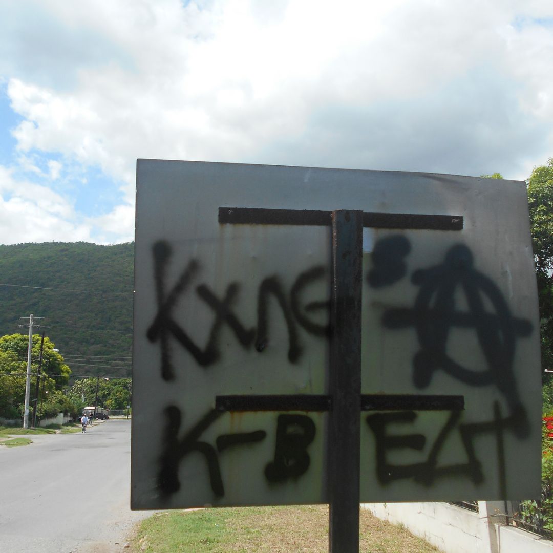 Image of graffiti on a sign