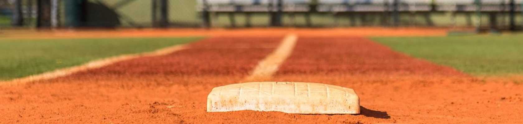 image of a ballfield that has been maintained near the first base line