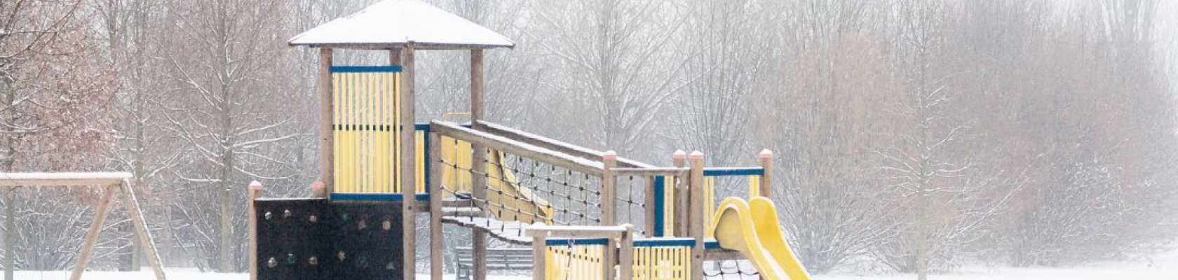 Image of a playground in winter