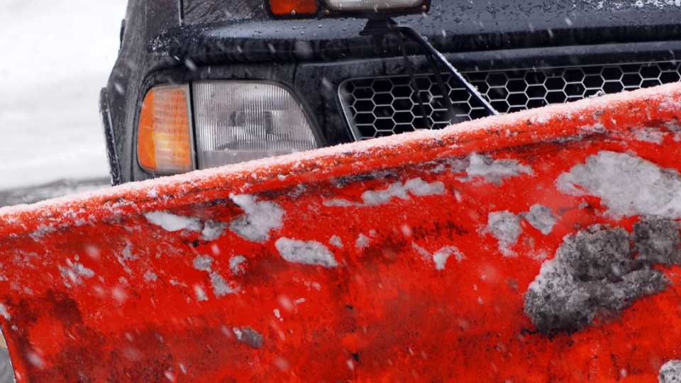 Image of a snow removal plow stocked with safety equipment