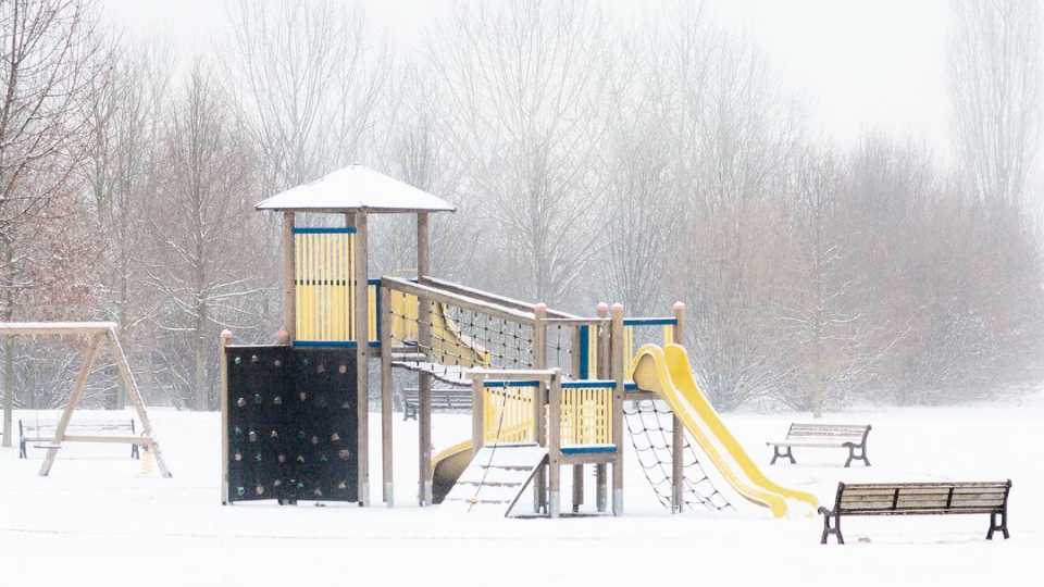 Image of a playground in winter